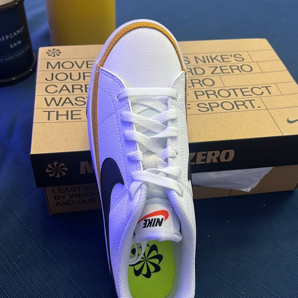 Nike size 7.5 white with black Nike check